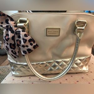 Betsy Johnson cream and gold bag in like new condition.